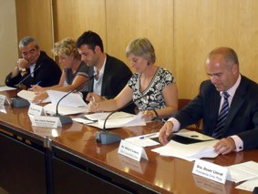 Signatura acord microcrèdits